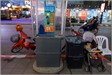 20180411_LGP4172 Child naps in stroller along street market - Chiang Mai, Thailand 