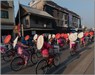 20180413_DSC5451 Cycling parade of parasol-carrying ladies - Songkran, Chiang Mai, Thailand